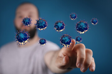 An image depicting a person interacting with digital rendered viruses. Concepts of digital health and disease