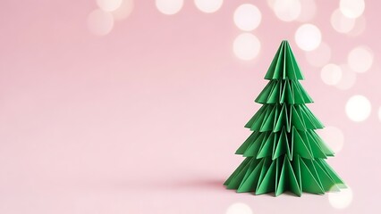 Obraz premium Origami christmas tree on pink background