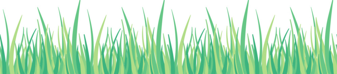 Fresh green grass blades growing against white background