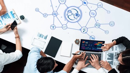 A diverse business team engages in dynamic data analysis using modern technology, showcasing collaboration and innovation in a contemporary office environment. Raster - Powered by Adobe