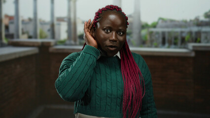 African american woman gestures listening in roman ruins setting, embodying curiosity amid...