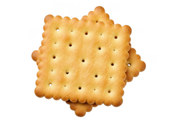 Two golden brown square crackers with ruffled edges stacked on a transparent background, top view