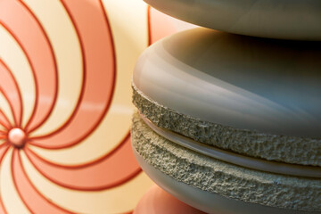 Abstract Close-up of Macaron Display and Swirling Background