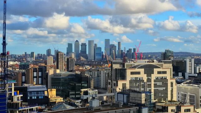  Beautiful panorama of London at sunset, view from the 40th floor include Canary Wharf on distance 