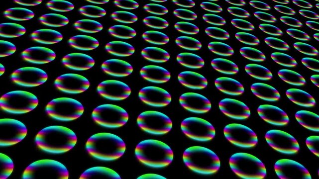 Abstract 3d pattern of glowing rainbow neon rings in perspective on a black background