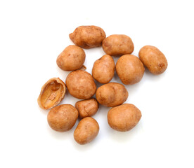 Dried peanuts in closeup on white