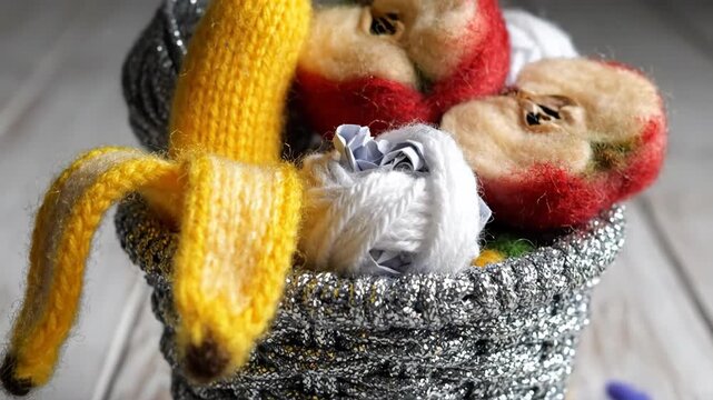 Overflowing Knitted Trash Can with Banana Peel and Apple Core 4K