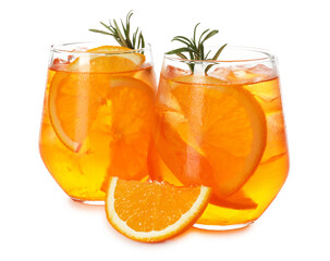 Glasses of refreshing spritzer cocktail and orange slice with rosemary isolated on white