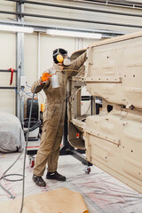 Professional anti corrosion undercoating treatment applied to hidden cavities of a car body. Long...