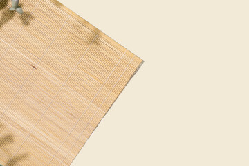 Background With Natural Bamboo Placemat On Neutral Backdrop With Soft Shadows. Ideal For Eco Branding, Product Mockups, Asian Cuisine Menus, Or Interior Design And Sustainable Living Concepts