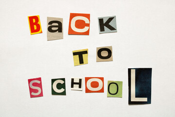 Back to school text with cutout magazine letters