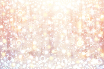 A festive abstract delicate Happy New Year or Christmas background texture with colorful gold yellow pink blurred bokeh lights and stars. Space for design. Card concept or advertising.