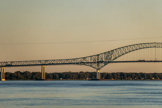 View of the Laviolette Bridge spanning the Saint Lawrence River at sunset