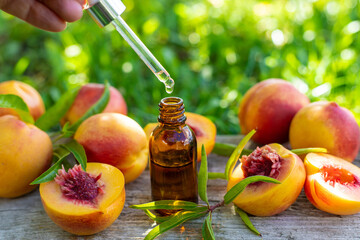 Peach kernel oil and supplements. Selective focus.