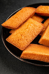 Financier biscuit cookie sweet dessert appetizer fresh tasty gourmet food table setting rustic food top view copy space