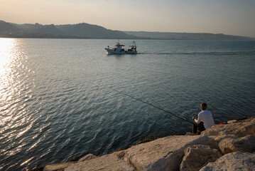 fisherman with a fishing rod