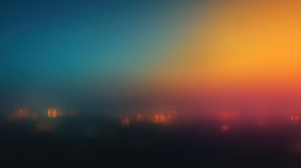 Obraz premium A mix of warm and cool colors fills the sky as night falls over a city. Soft lights from buildings create a blurred effect against the vibrant background.