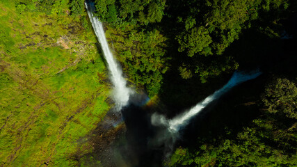 Zipline flights. Tad Fane waterfall in rainforest at Pakse and Champasak city Laos. Tour tourism and travel in Asia.