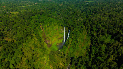 Zipline flights. Tad Fane waterfall in rainforest at Pakse and Champasak city Laos. Tour tourism and travel in Asia.