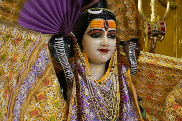 Lord Shiva Statue Inside Hindu Temple with Spiritual and Sacred Background