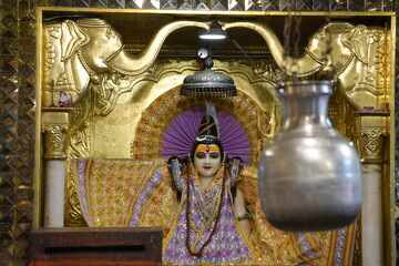 Lord Shiva Statue Inside Hindu Temple with Spiritual and Sacred Background