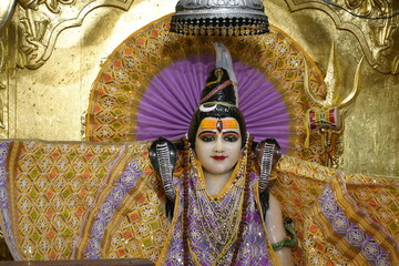 Lord Shiva Statue Inside Hindu Temple with Spiritual and Sacred Background