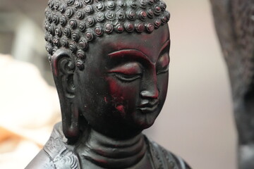 Black Buddha Head Statue Displayed in Indian Handicraft Market