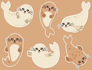 A set of seal stickers in various poses. Cute sea animals.