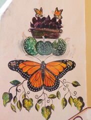 painting of monarch butterfly on a wall in a town in Michoacan, Mexico