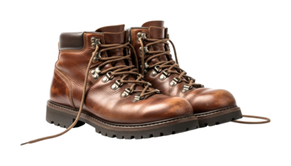 Pair of brown leather hiking boots, showcasing their rugged texture, sturdy soles, and untied laces, ready for adventure or outdoor work.