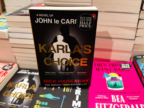 Karlas Choice: A gripping novel by Nick Harkaway on a bookstore display shelf