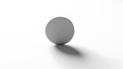 A gray circle object casting a shadow on a white background in a minimalist style