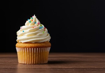 Delightful vanilla cupcake topped with rich swirl frosting and colorful sprinkles, perfect for celebration menus, birthdays, and sweet dessert promotions, macro, indulgence, snack