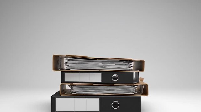 Three stacked file binders on a desk with a white paper plane soaring above a smooth gray backdrop.
