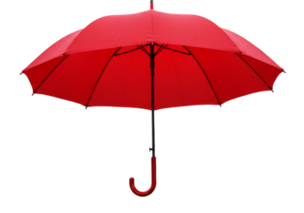 Vibrant red umbrella stands open, protecting from rain, with visible raindrops on its surface, symbolizing shelter and readiness for wet weather.