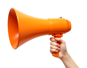 Orange megaphone, a powerful communication tool, is held firmly in a hand, ready to project a message loudly and clearly to a large audience.
