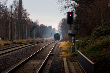 old steam train Dampflok with a lot of steam in saxony bischofswerda 528141-5 Dampflok