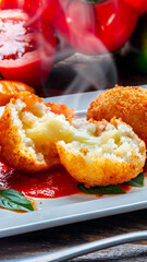 Fried rice balls. Traditional from Brazil where it is called Bolinho de arroz.