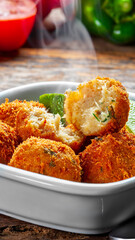 cod dumpling, salt cod fritters, bunuelos de bacalao. Brazilian snack 