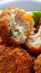 cod dumpling, salt cod fritters, bunuelos de bacalao. Brazilian snack 