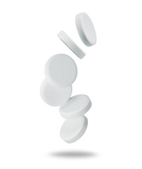 Medical fizzy pills in the air close-up on a white background