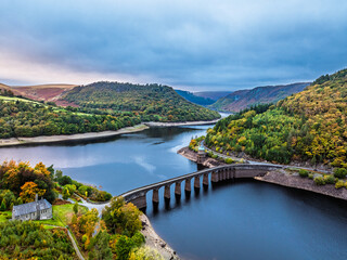 Autumn over Garreg Ddu Dam from a drone, Elan Valley, Caban-Coch Reservoir, Rhayader, Wales, UK	