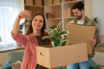 Couple celebrating new home moving day with keys