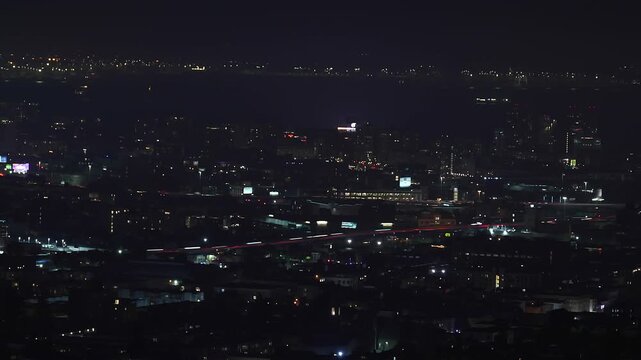 Evening traffic shift in a lively rhythm across Downtown San Francisco from Twin Peaks, revealing the city&rsquo;s energetic pulse.