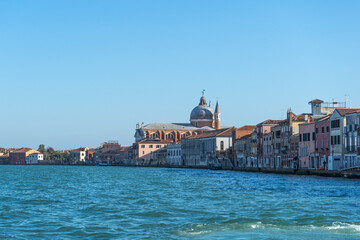 Giudecca waterfront with Il Redentore church in Venice