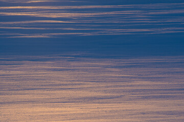 The pattern of the snowy field drawn by the morning light