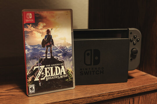 The Legend of Zelda: Breath of the Wild Video Game Next to a Nintendo Switch on a Shelf in Tipton, Missouri, April 2025