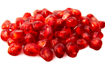 Bright red pomegranate seeds isolated on a clean white background for fresh and healthy food displays