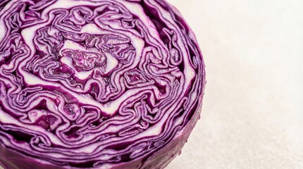 Obraz premium Vibrant Fresh Purple Cabbage Cross-Section with Water Droplets