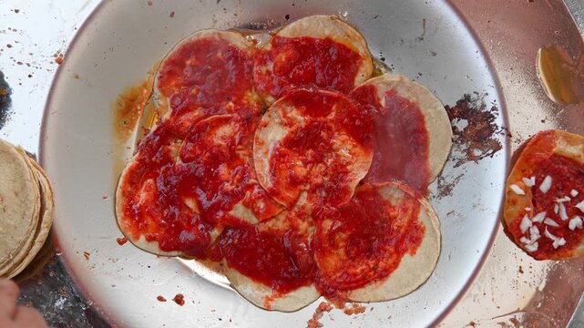 Chef cooking traditional mexican chalupas food